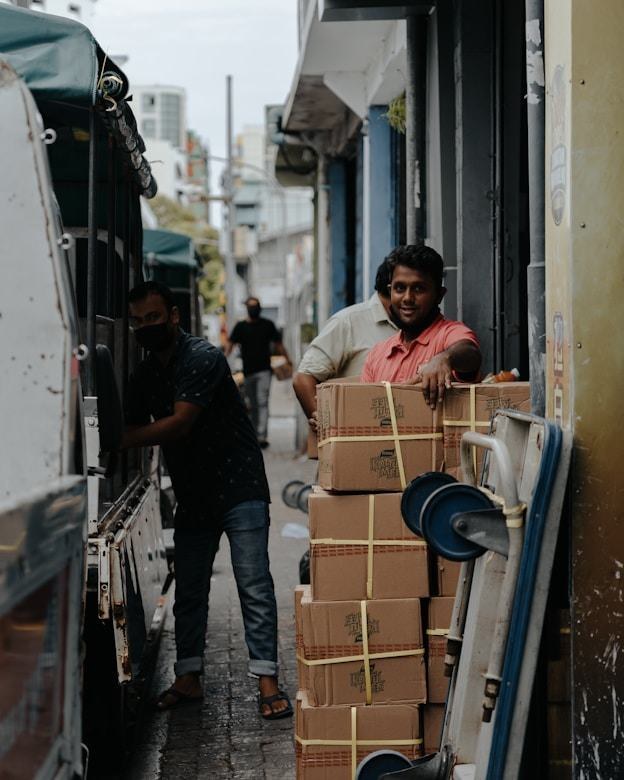 Hans Air Express delivery worker handling a domestic parcel for doorstep courier service in Mumbai